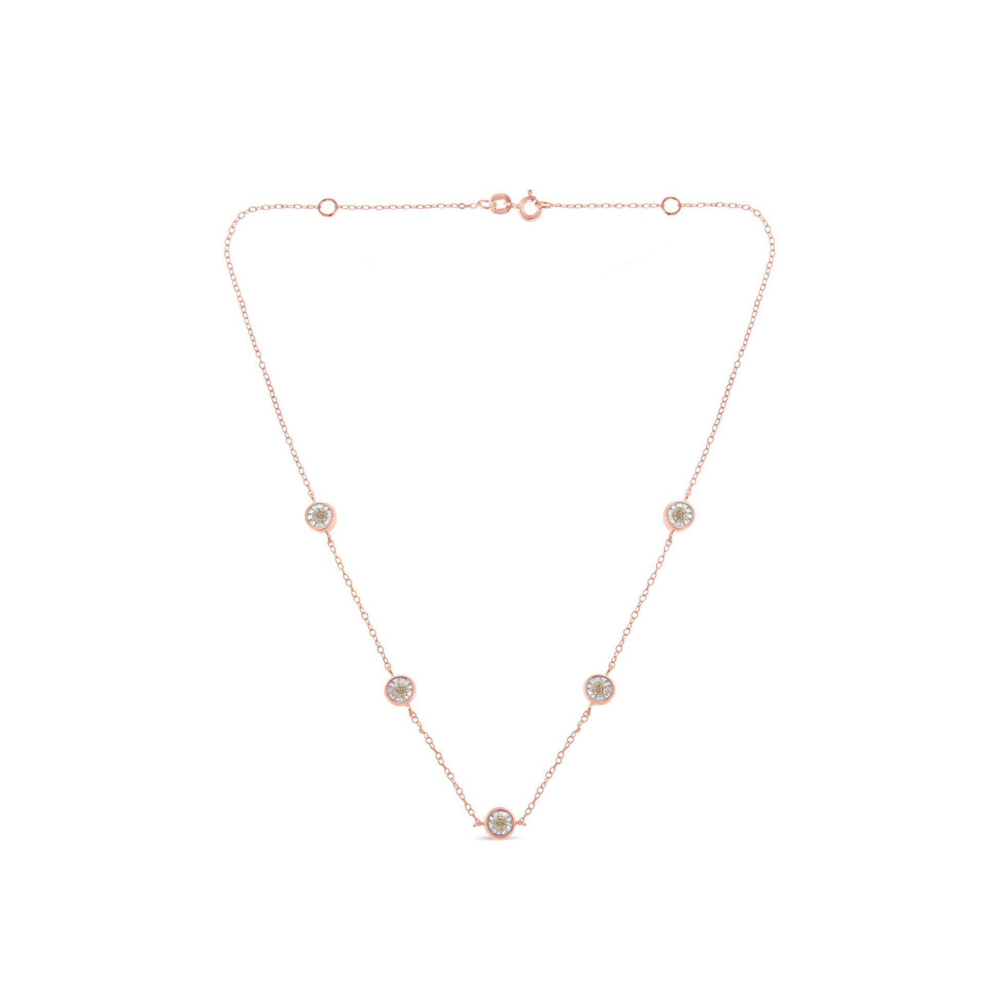 Rose metal necklace with five round brownish gemstones in miracle settings, front-facing angle.