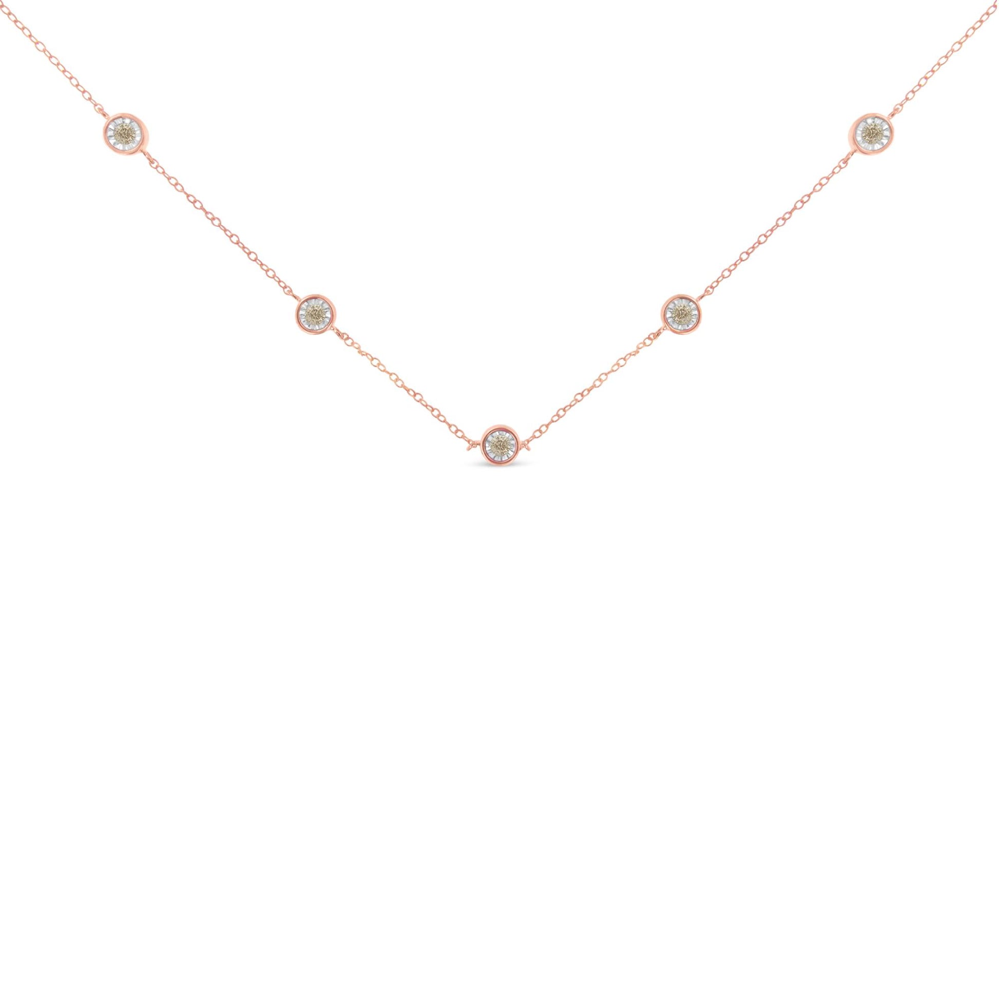 Close-up front view of a rose metal necklace featuring five round brownish gemstones in miracle settings evenly spaced along the chain.
