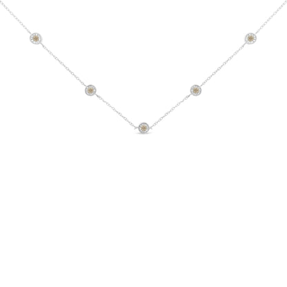 White metal necklace with five round white gemstones in miracle settings evenly spaced along the chain, front-facing angle.