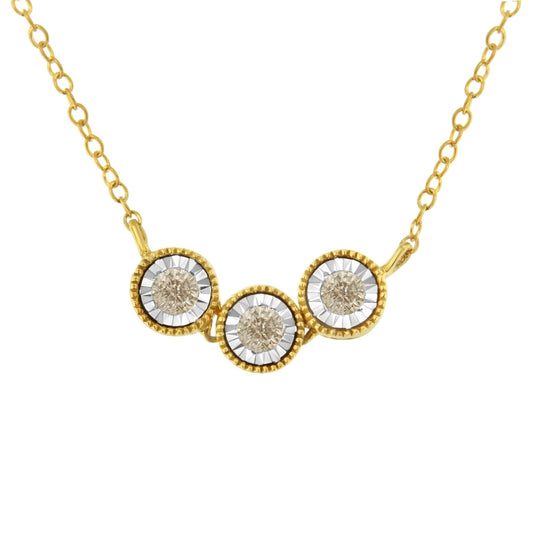Front view of a two-toned necklace with three round champagne-colored gemstones in miracle settings.