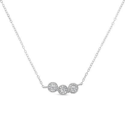 Front view of a white necklace with three round white gemstones in a miracle setting on a delicate chain.