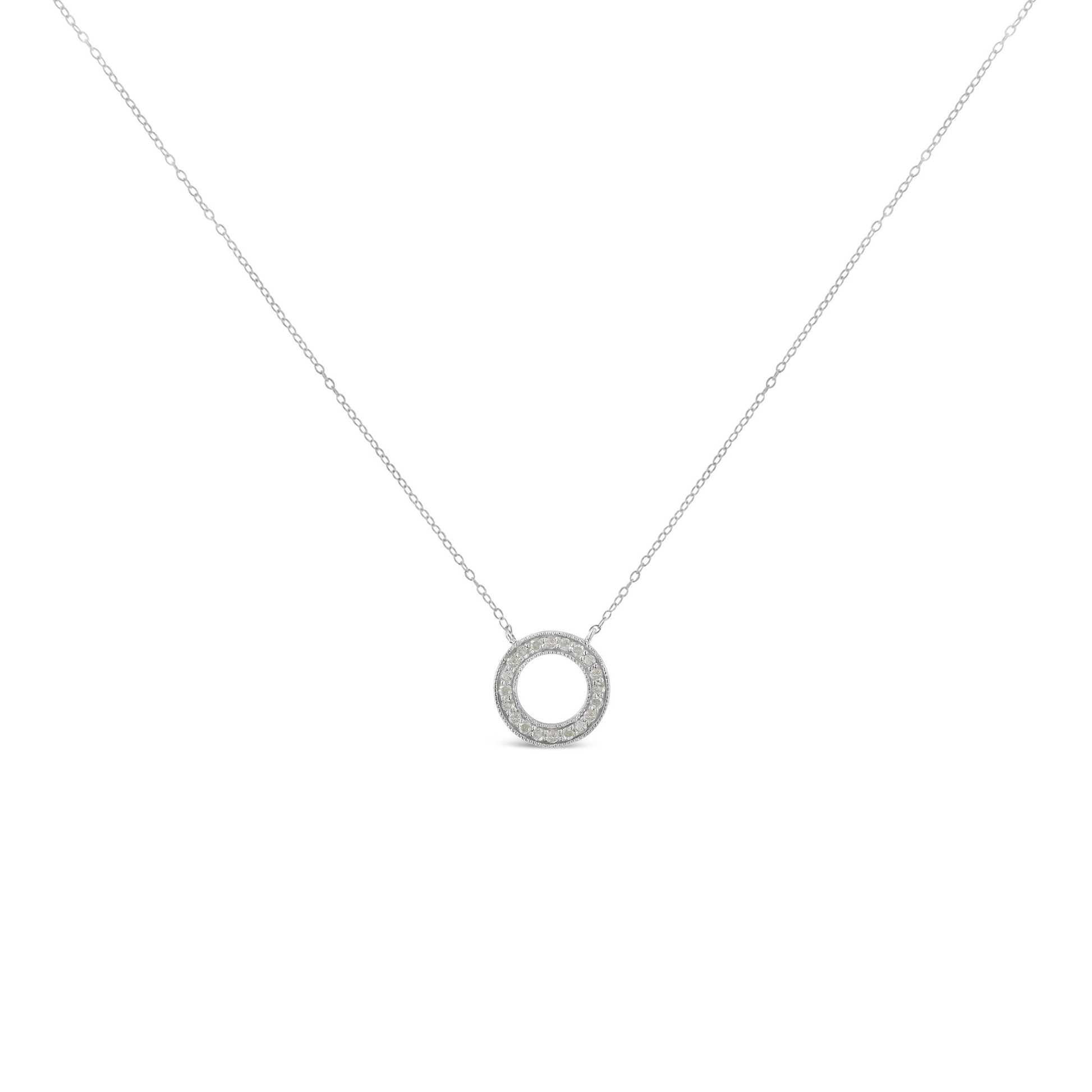 Front view of a white metal necklace with a circular pendant featuring round white gemstones in a pave setting.