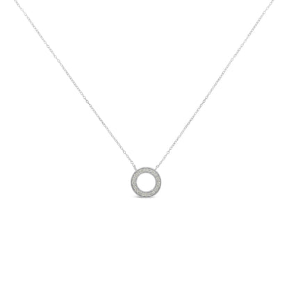 Front view of a white metal necklace with a circular pendant featuring round white gemstones in a pave setting.