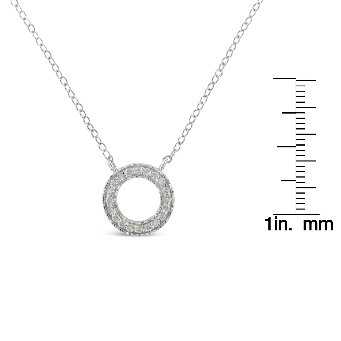 Front view of a white metal circular pendant necklace with round white gemstones in pave setting, shown with a ruler for size reference.