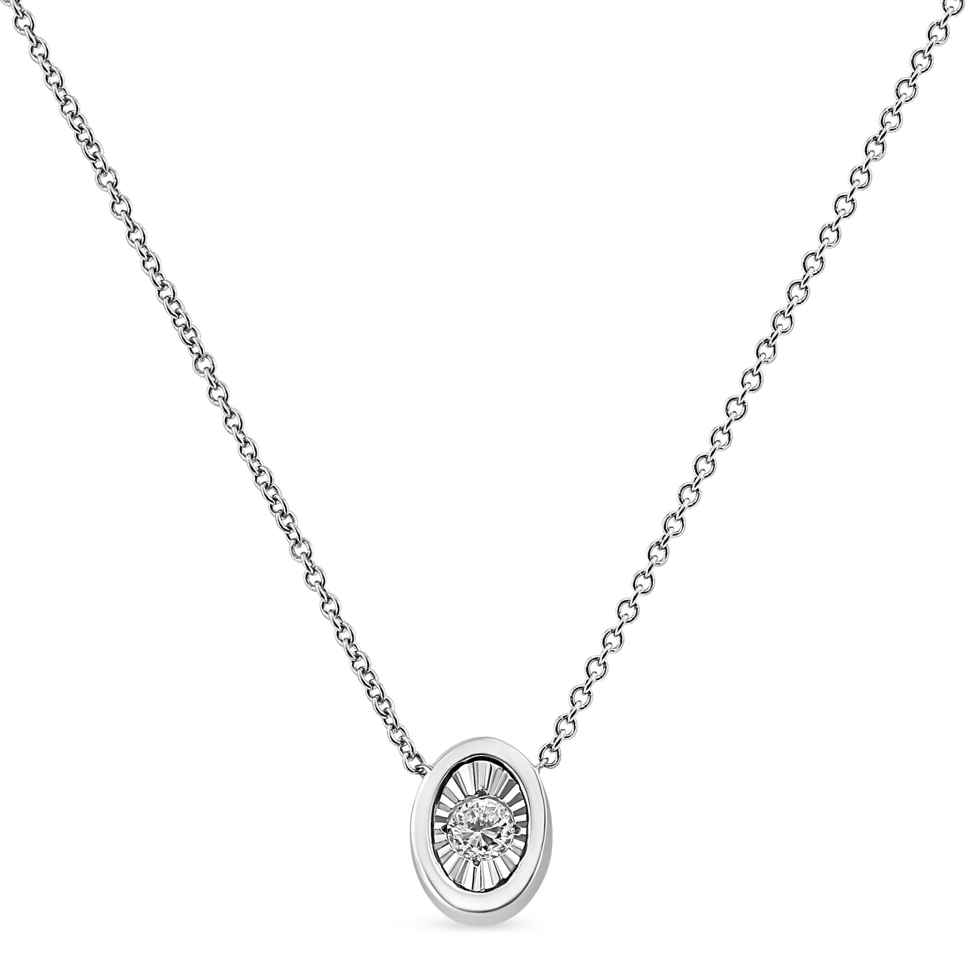 Front view of white metal necklace with oval-shaped pendant featuring a round white gemstone in miracle setting.