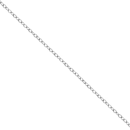 Diagonal close-up of a white metal necklace chain with a single round white gemstone in a miracle setting.