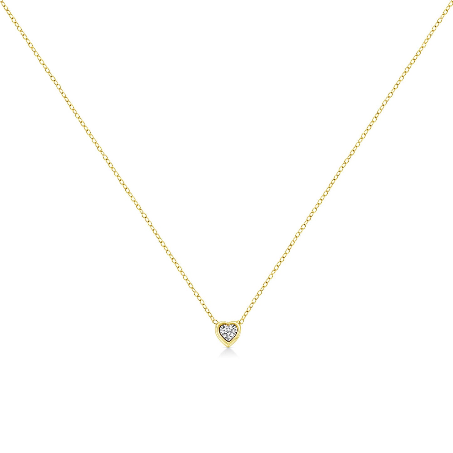 Front-facing shot of a yellow necklace with a heart-shaped pendant featuring a round white gemstone in miracle setting.