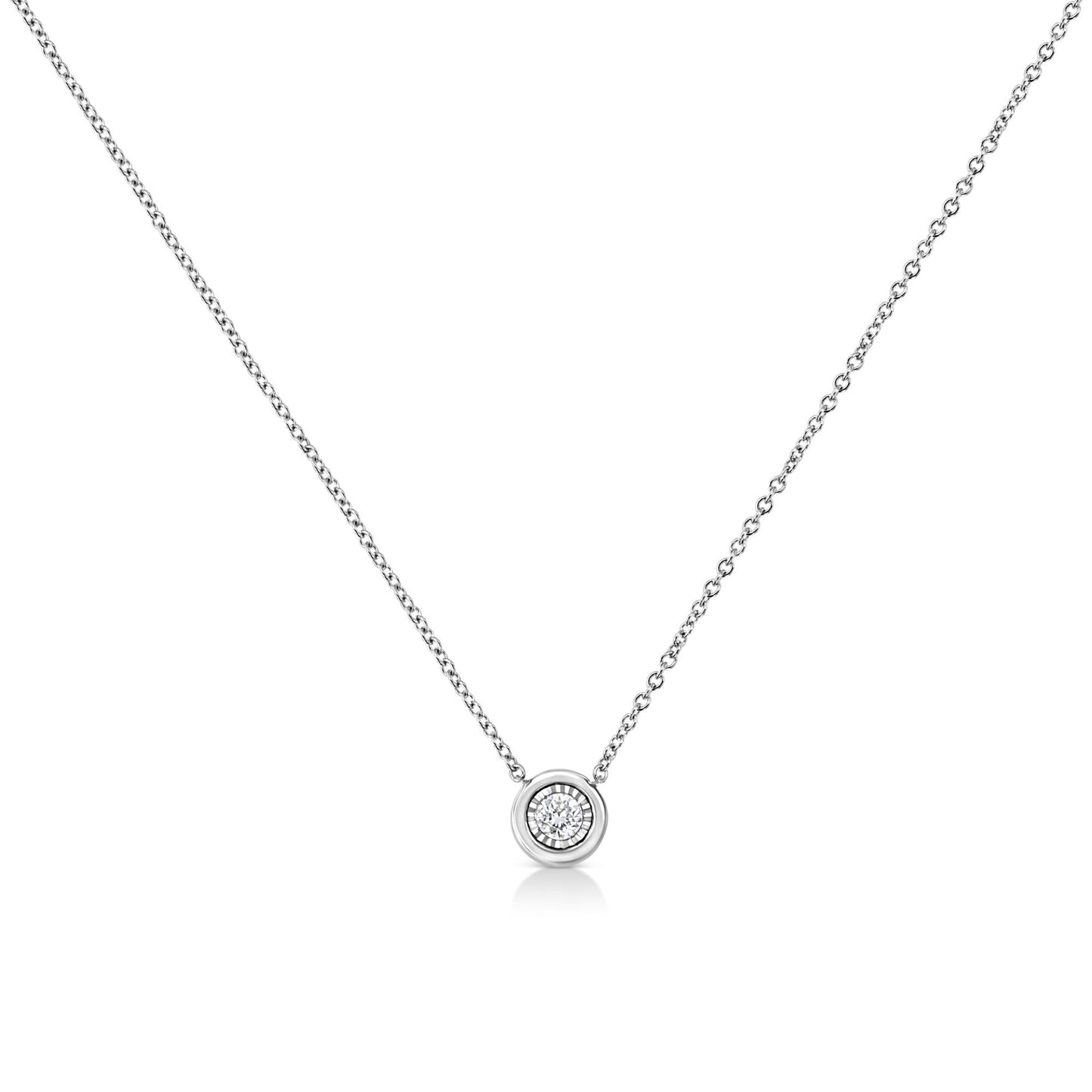 Front view of white metal necklace with a round white gemstone in a bezel setting.
