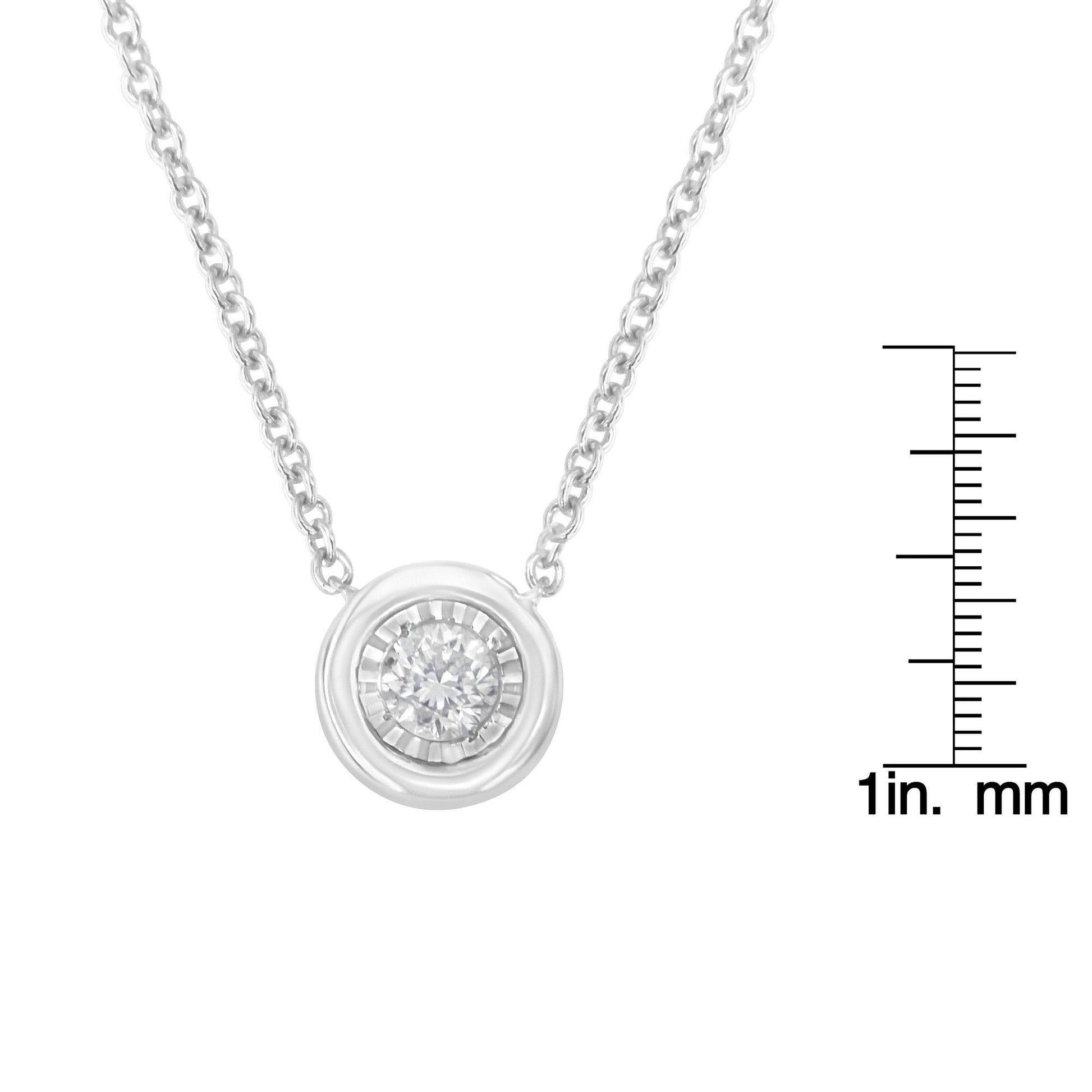 Close-up front view of a white metal necklace with a round white gemstone in a circular setting, displayed on a ruler for size reference.