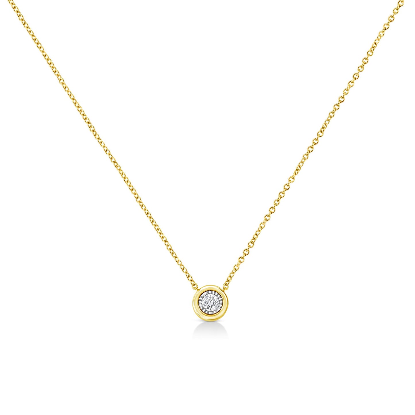 Front-facing view of a yellow metal necklace with a round shaped gemstone in a miracle setting pendant.