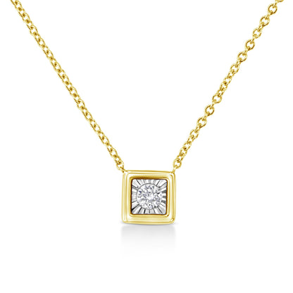 Close-up front view of a yellow metal necklace with a square pendant featuring a single round white gemstone in miracle setting.