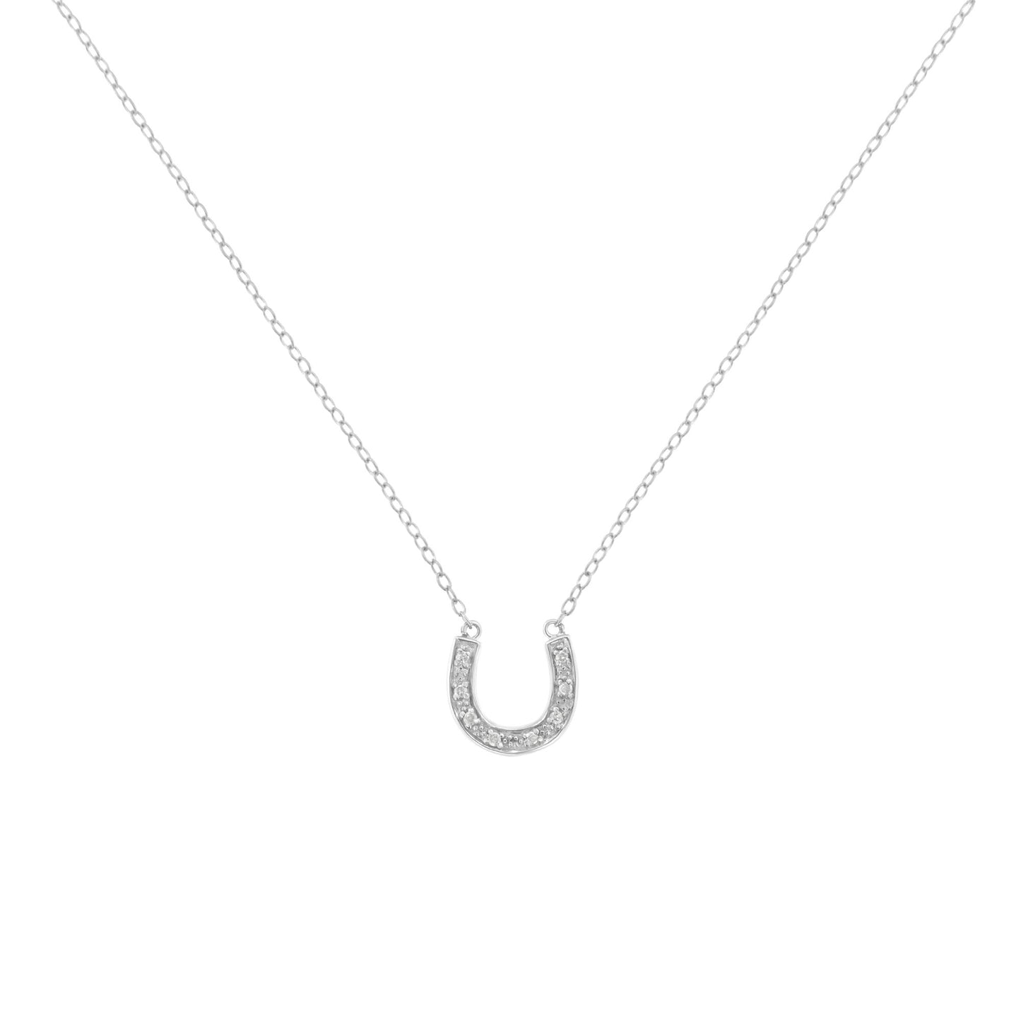 Front-facing shot of a white metal necklace with a horseshoe-shaped pendant set with small round white gemstones in a pave setting.