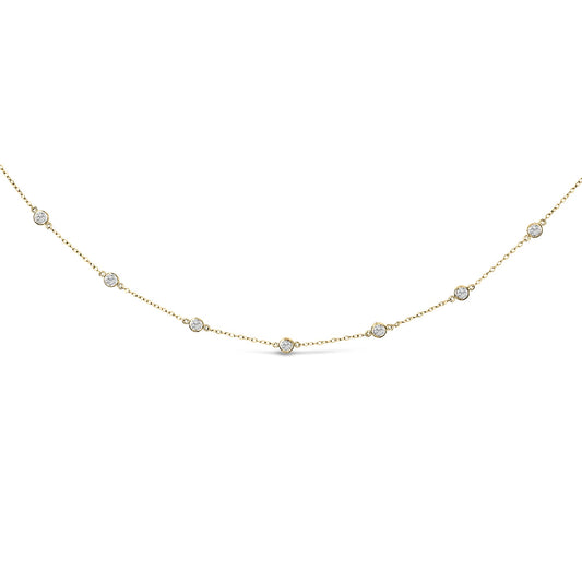 Yellow necklace with round white gemstones in bezel settings, shown from a front angle.