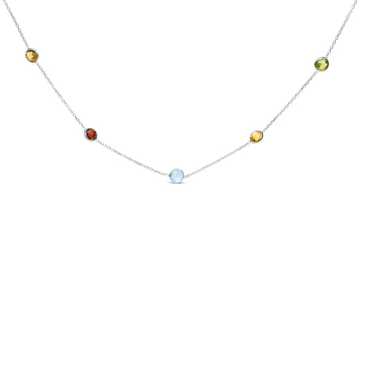 Front-facing shot of a white metal necklace with round bezel-set gemstones in blue, purple, red, white, smoky, yellow, and green colors spaced evenly along the chain.