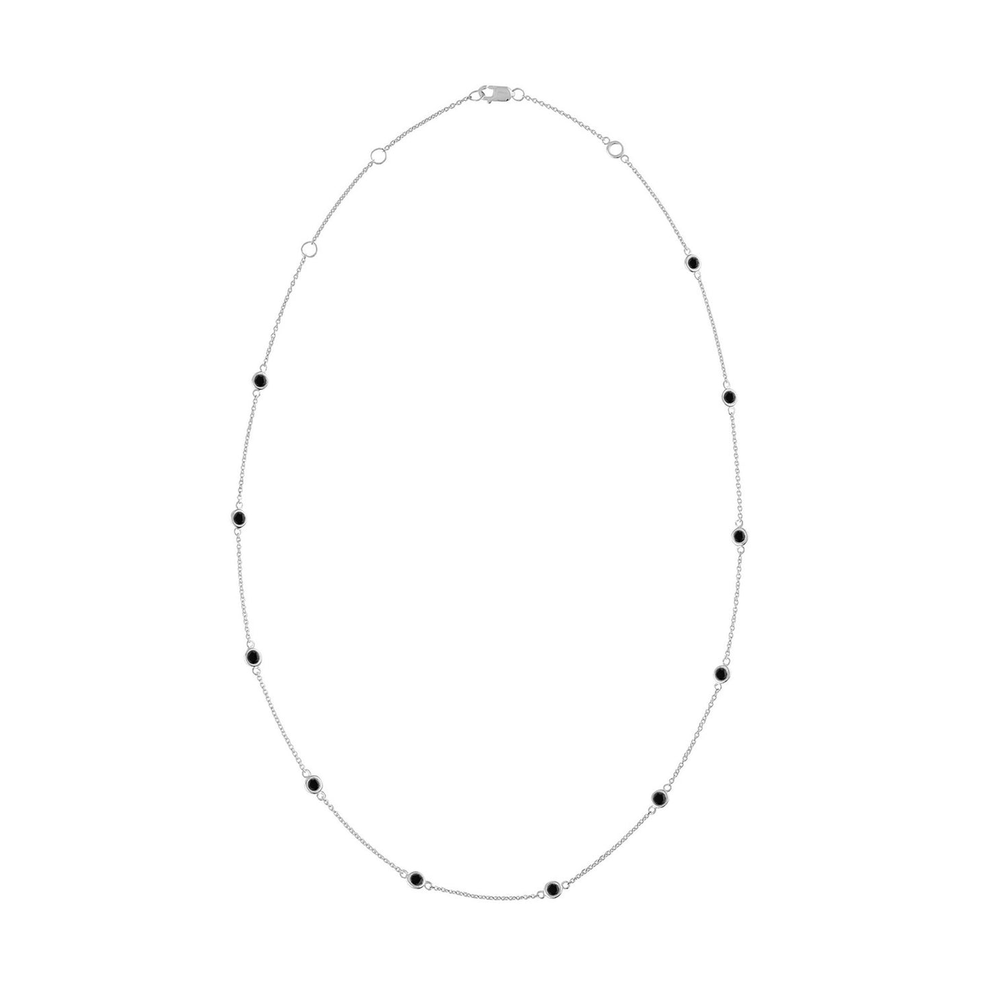 White metal necklace with evenly spaced round black gemstones in bezel settings, shown flat from a top-down angle.