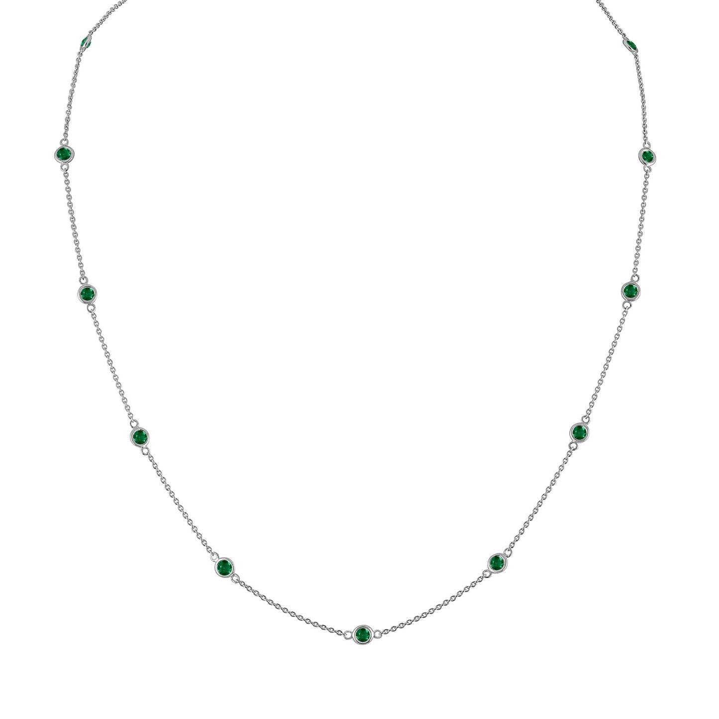 Front view of a white metal necklace with evenly spaced round green gemstones in bezel settings along a thin chain.