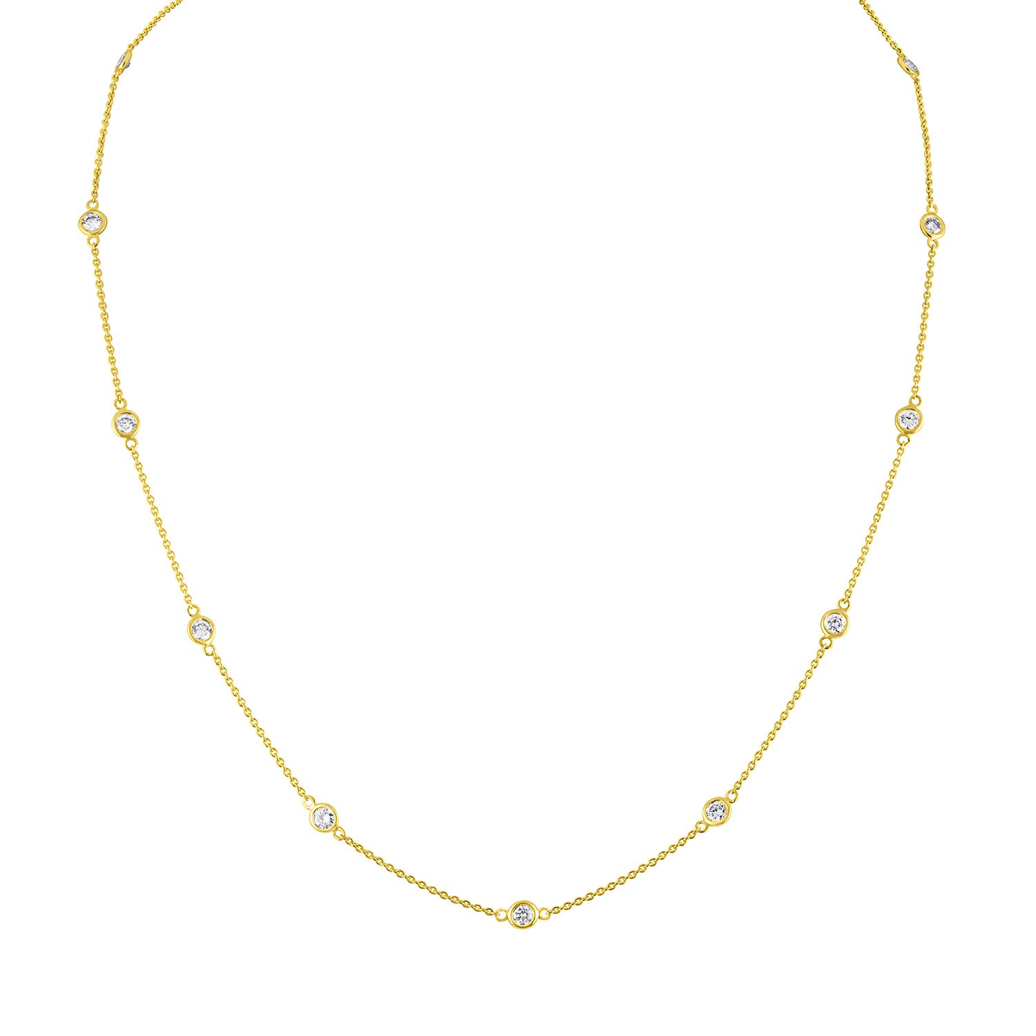 Front-facing close-up of a yellow necklace with round white gemstones in bezel settings spaced along the chain.