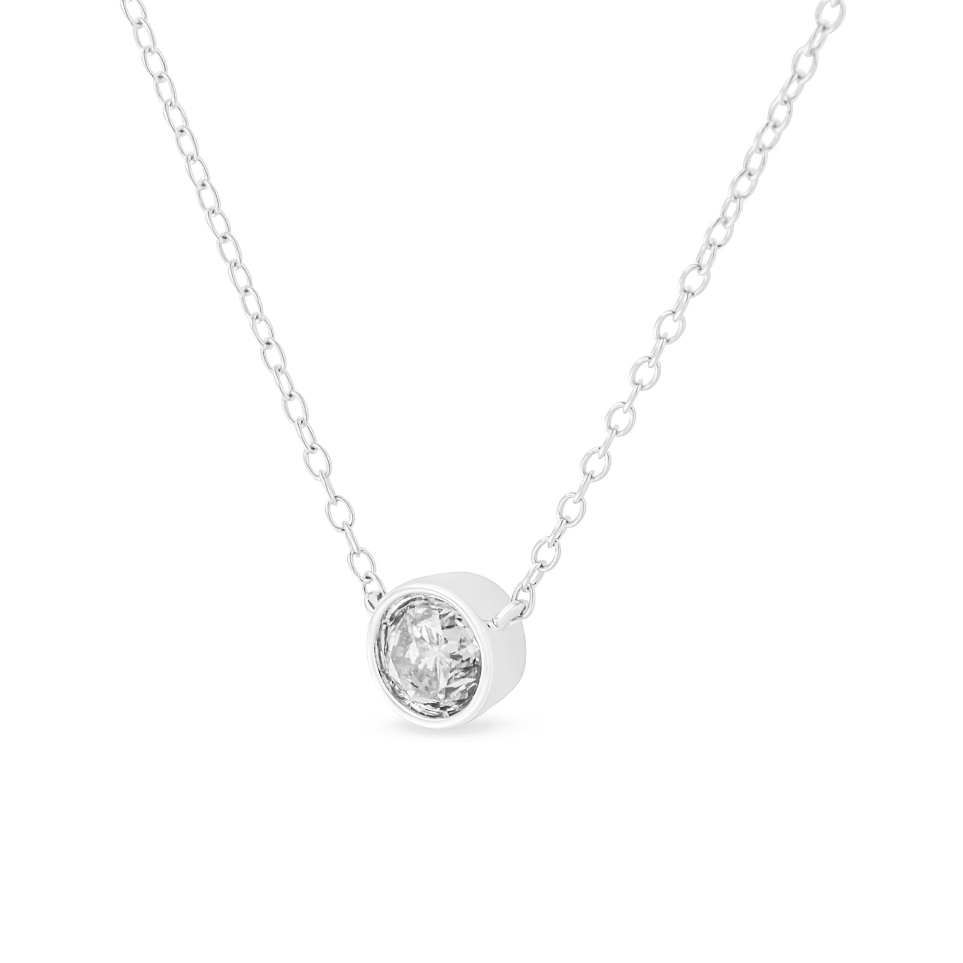 White metal necklace with a round white gemstone in bezel setting, shown from a front angle.