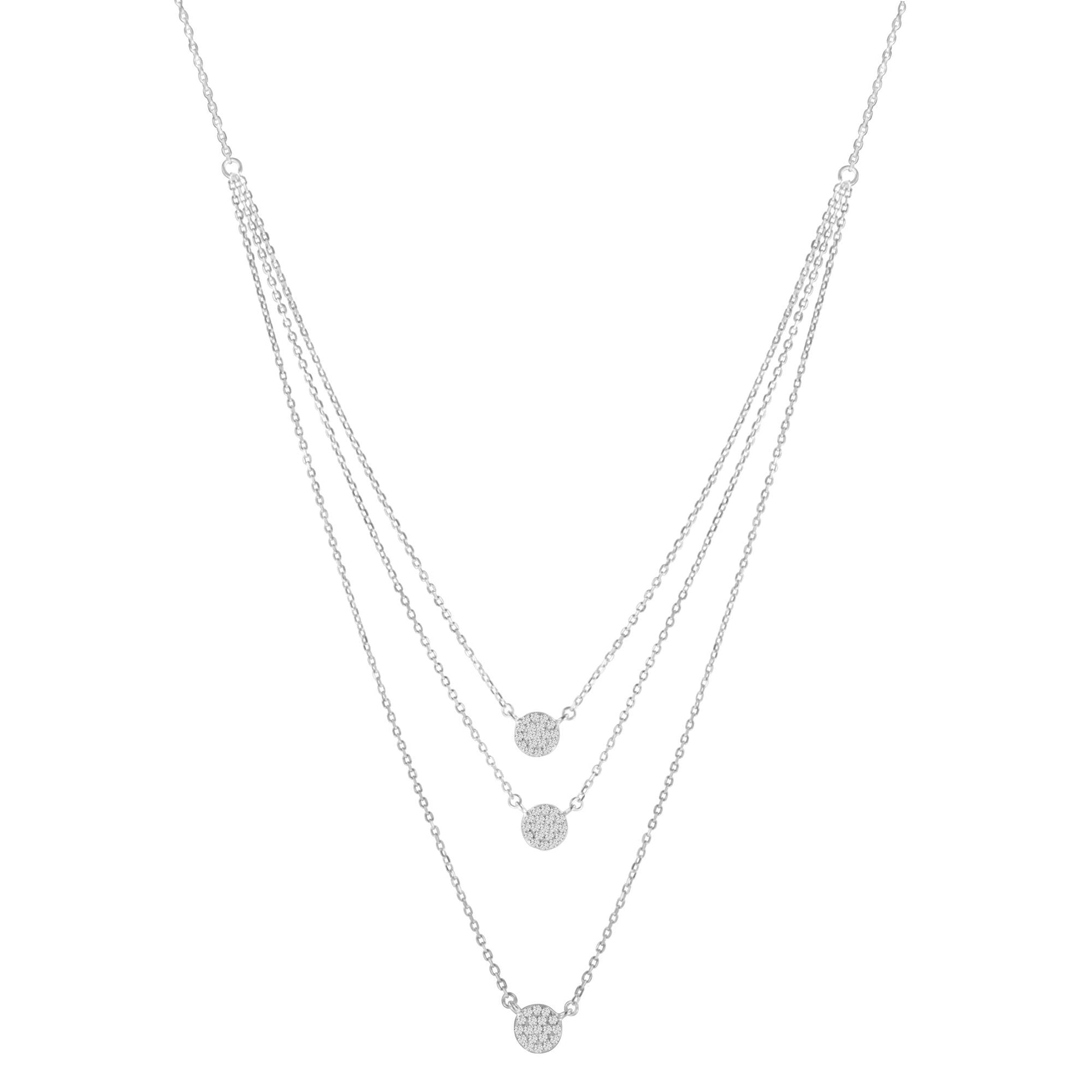 Front view of a white metal necklace with three layered chains, each featuring a round pendant paved with small white gemstones in prong settings.