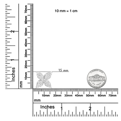 White metal necklace pendant with four petal-like shapes, each paved with round white gemstones, set in prongs; pendant shown on rulers and next to a coin for size reference, front angle view.