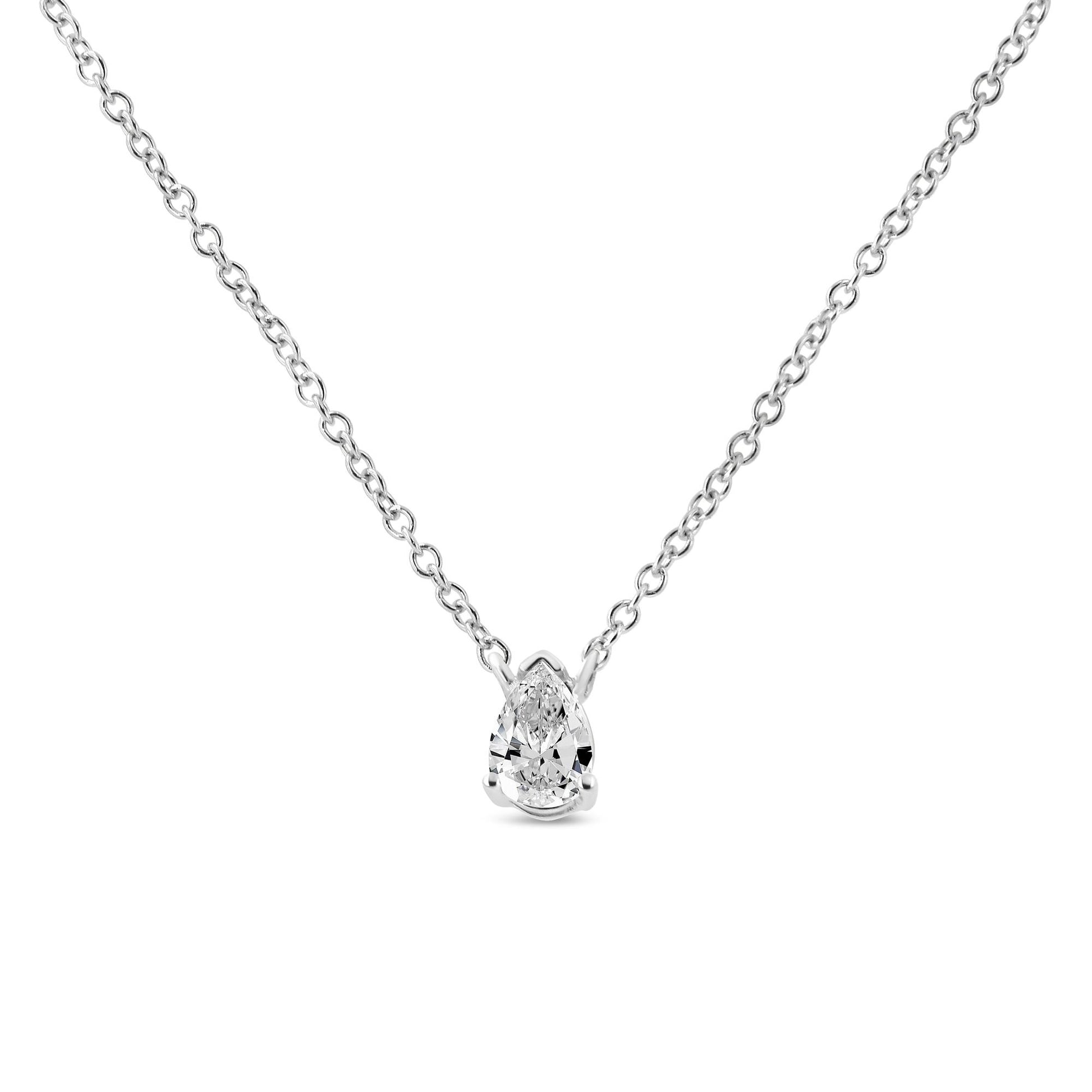 Front-facing white metal necklace with a pear-shaped white gemstone in a four-prong setting, shown against a white background.