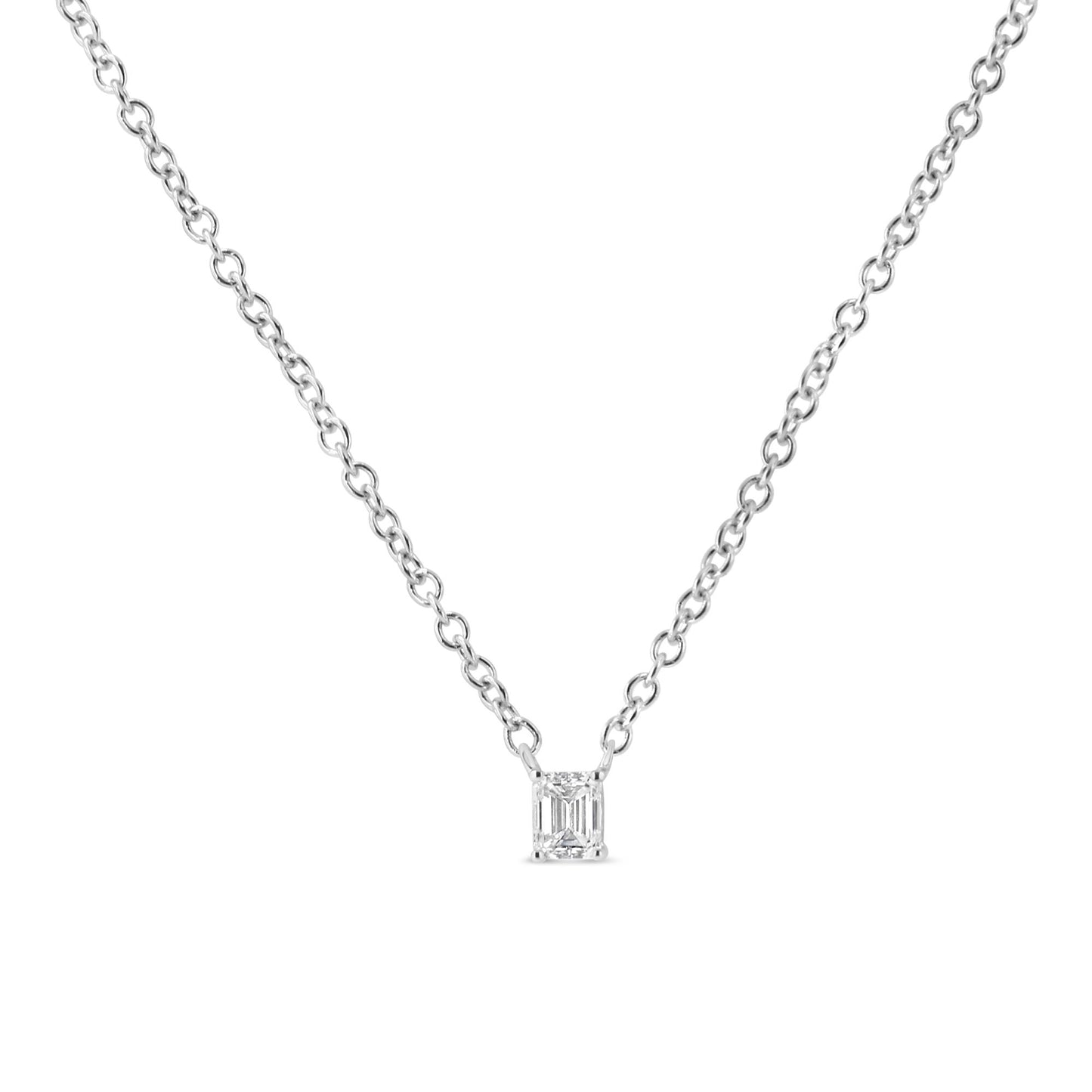 Necklace with a white metal chain and a single emerald-shaped white gemstone pendant in a 4-prong setting, photographed from the front.