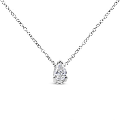 Front view of a white metal necklace with a pear-shaped white gemstone in a three-prong setting pendant.