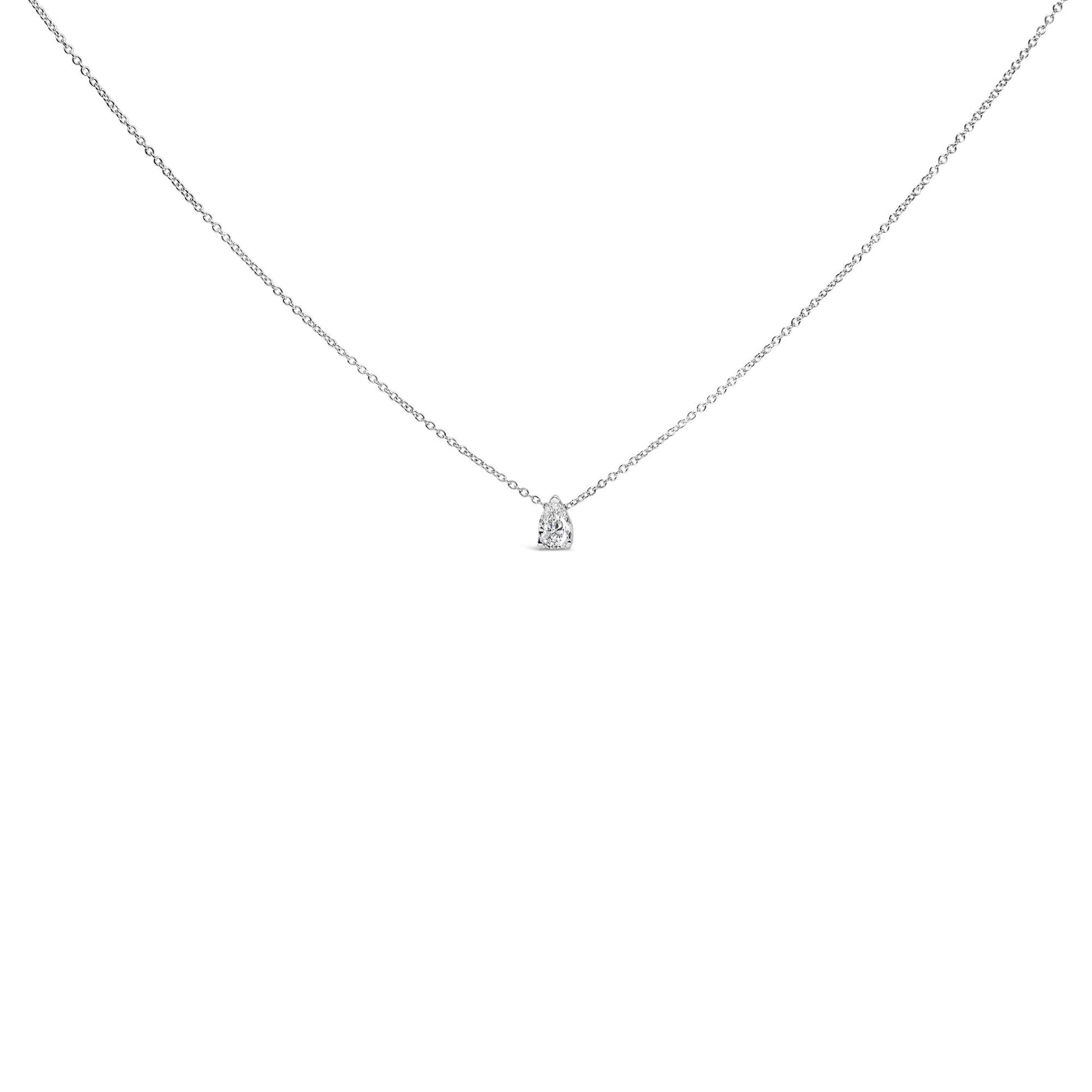 Image of a white metal necklace with a single pear-shaped white gemstone pendant in a 3-prong setting, shown from the front on a white background.
