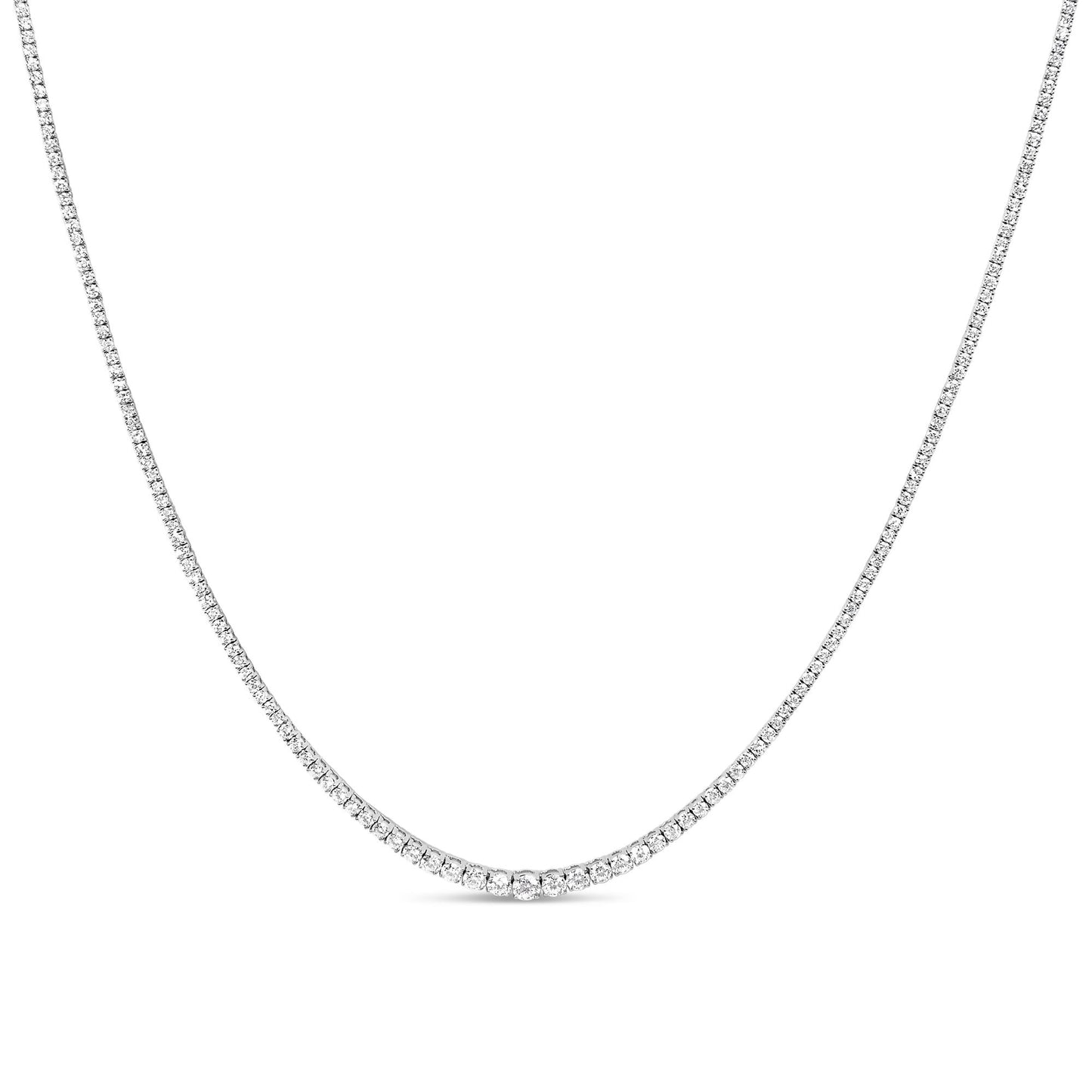 Front view of a white metal necklace featuring a continuous line of round white gemstones in four-prong settings.