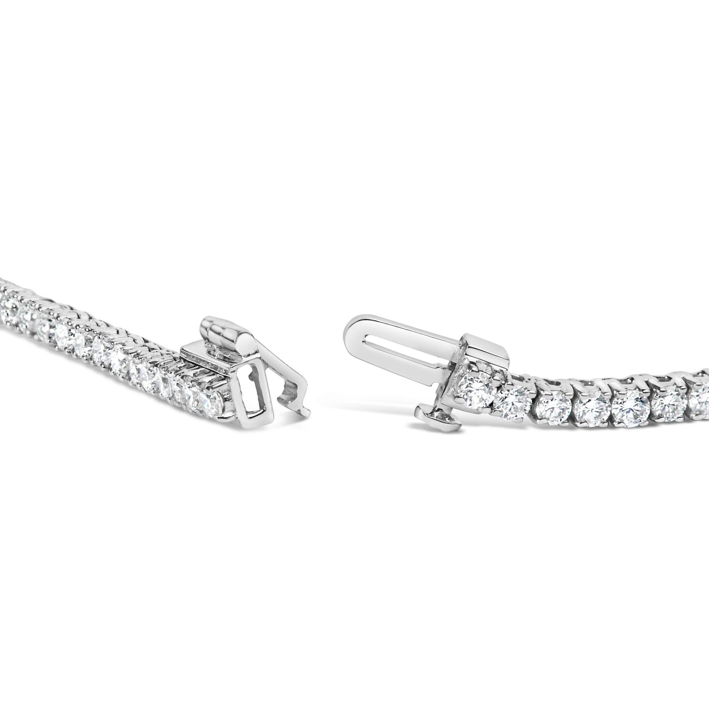 Close-up front angle of a white metal necklace with round white gemstones in 4-prong settings, showing the open clasp.