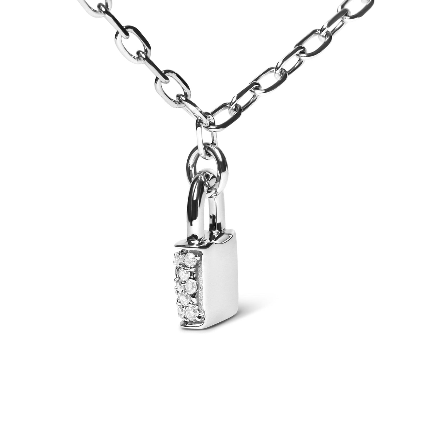 Close-up angled view of a white metal chain necklace with a small rectangular padlock pendant featuring a row of prong-set round white gemstones on one side.