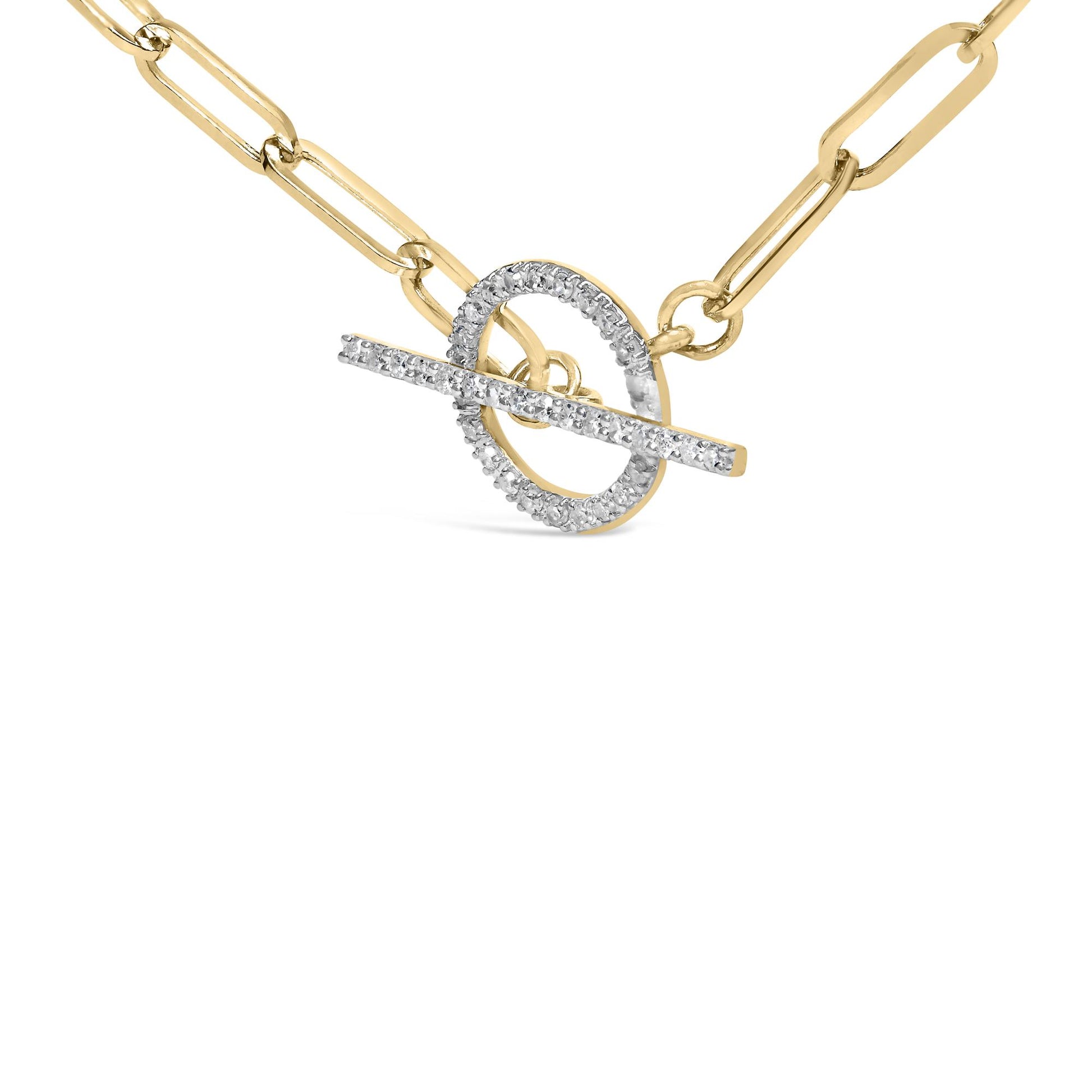 Close-up front angle of a yellow metal necklace with a toggle clasp adorned with white round gemstones in prong settings.