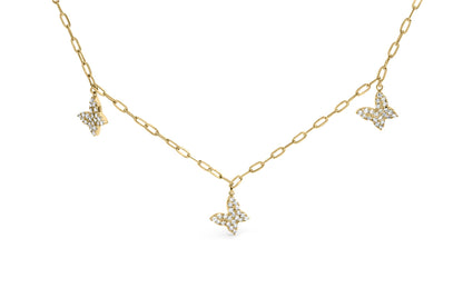 Yellow metal necklace with three butterfly-shaped pendants adorned with white round gemstones in prong settings, shown in a front-facing angle.