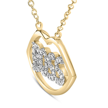 Close-up angled view of a yellow and white metal necklace pendant featuring a geometric open frame with a center design decorated with round white gemstones in prong settings.