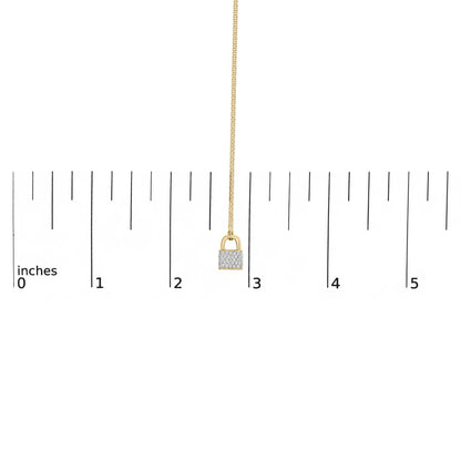 Close-up front view of a yellow metal necklace with a padlock-shaped pendant encrusted with small round white gemstones, displayed against a ruler for size reference.