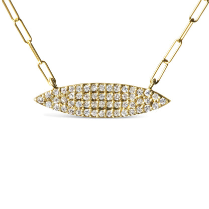 Front-facing close-up of a yellow metal necklace with an elongated oval pendant encrusted with multiple white round gemstones in prong settings.