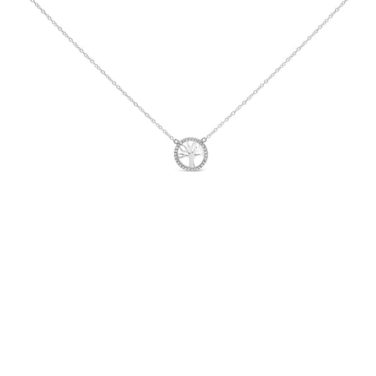 Front angle of a white metal necklace with a circular pendant featuring a tree design, surrounded by small round white gemstones in prong settings.