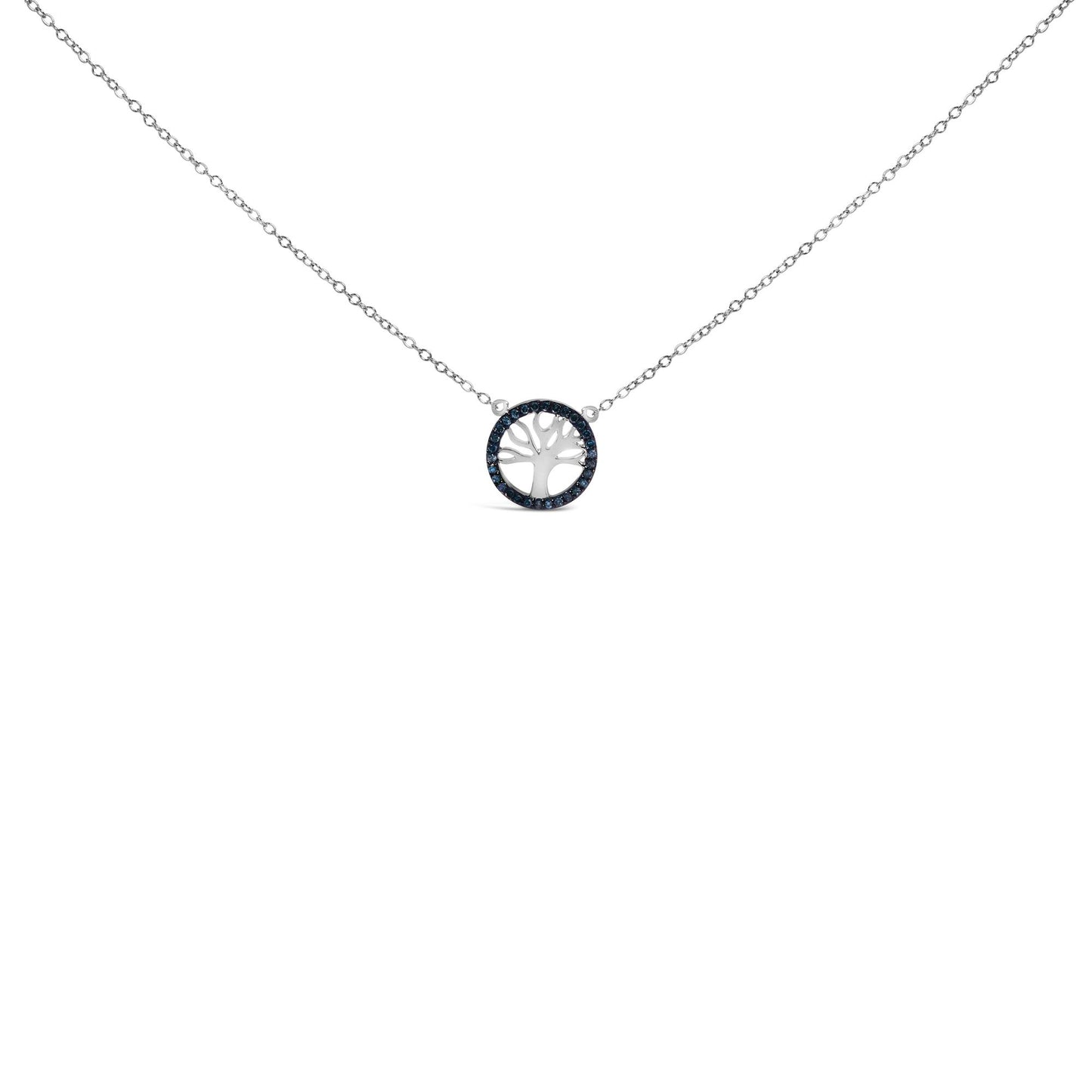 Front-facing shot of a white metal necklace featuring a circular pendant with a tree cutout, surrounded by round blue gemstones in prong settings.