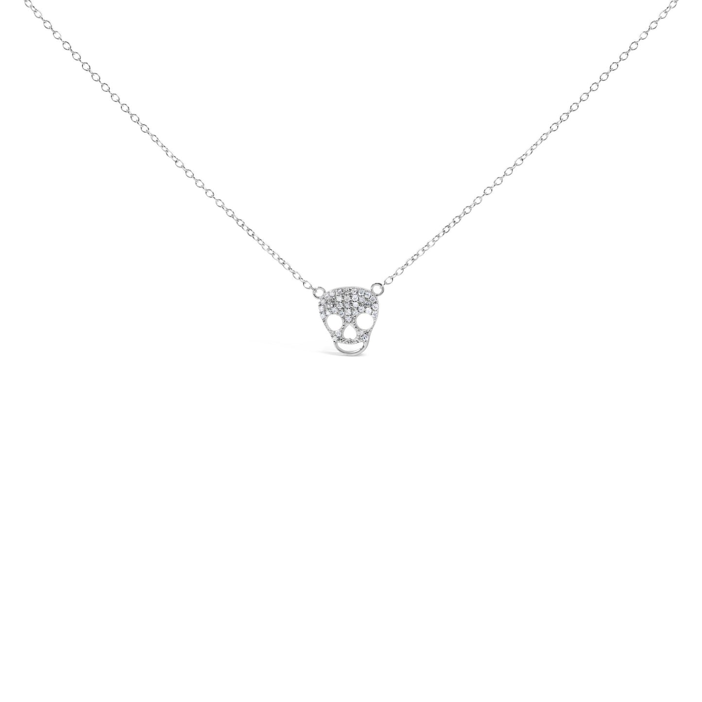 Front view of a white metal necklace with a skull-shaped pendant featuring multiple round white gemstones in a prong setting.