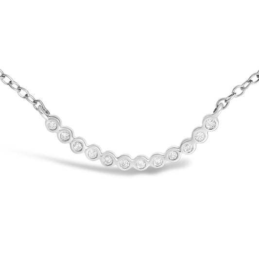 Close-up front angled view of a white necklace featuring a curved bar with round white gemstones in prong settings, connected to a link chain on both ends.