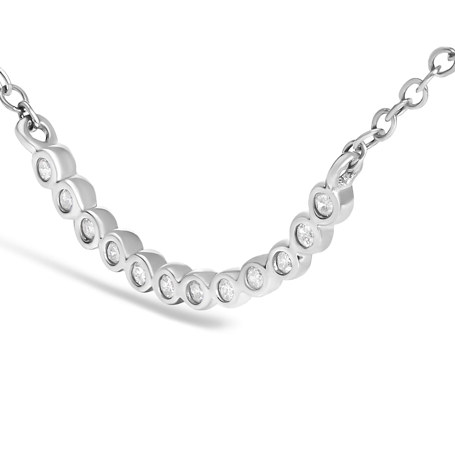 Close-up angled view of a white-colored necklace with a curved bar pendant featuring round white gemstones set in prongs, attached to a chain on both ends.