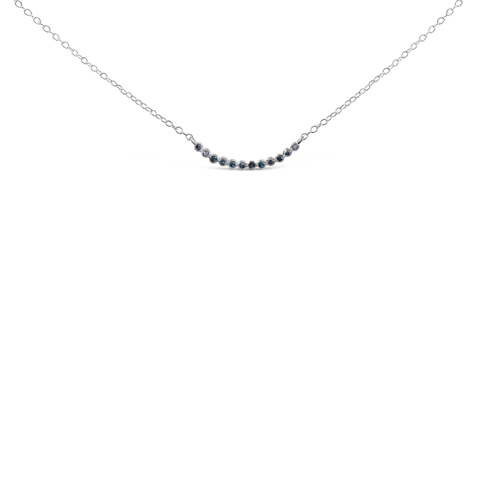 White necklace with a curved bar set with round blue gemstones in prong settings, shown from the front on a white background.