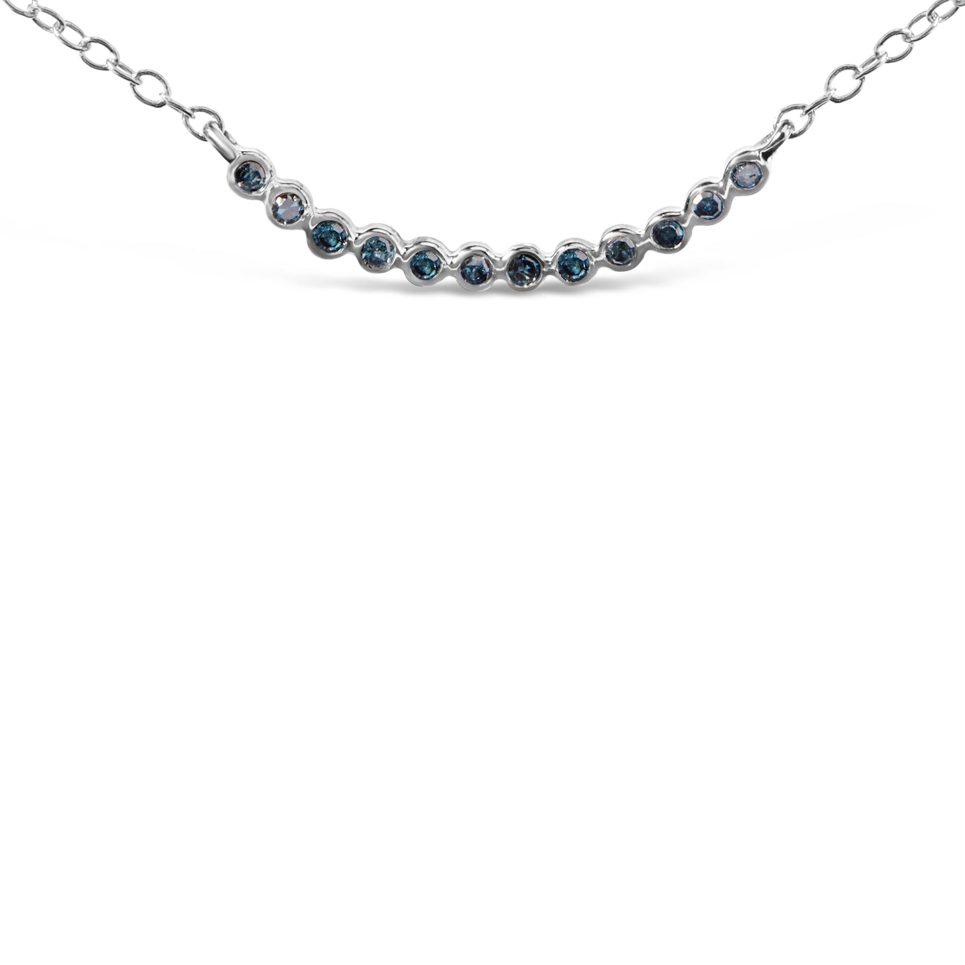Close-up front view of a white metal necklace featuring a curved row of round blue gemstones set in prongs, shown on a white background.
