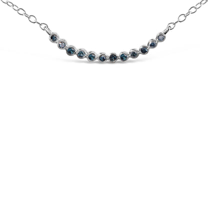 Close-up front view of a white metal necklace featuring a curved row of round blue gemstones set in prongs, shown on a white background.