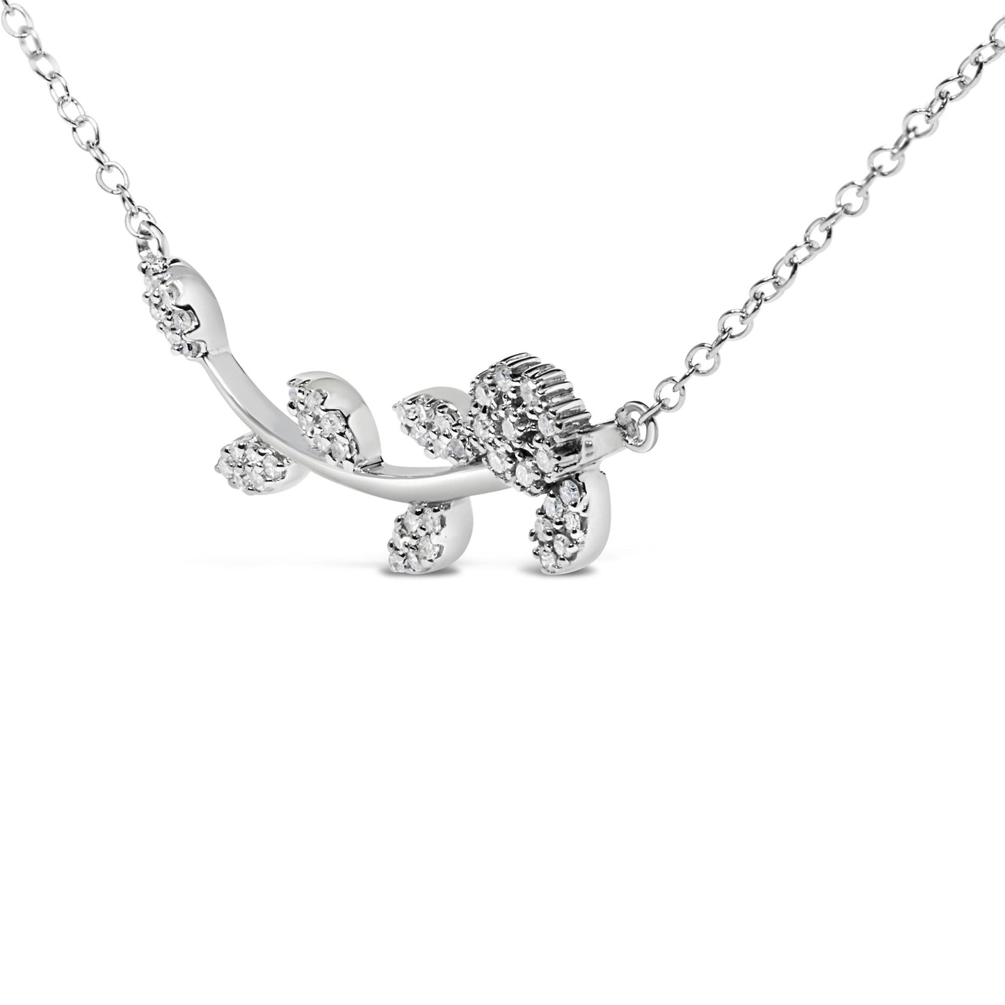 Close-up front angle of white metal necklace with a branch design adorned with round white gemstones in prong settings.