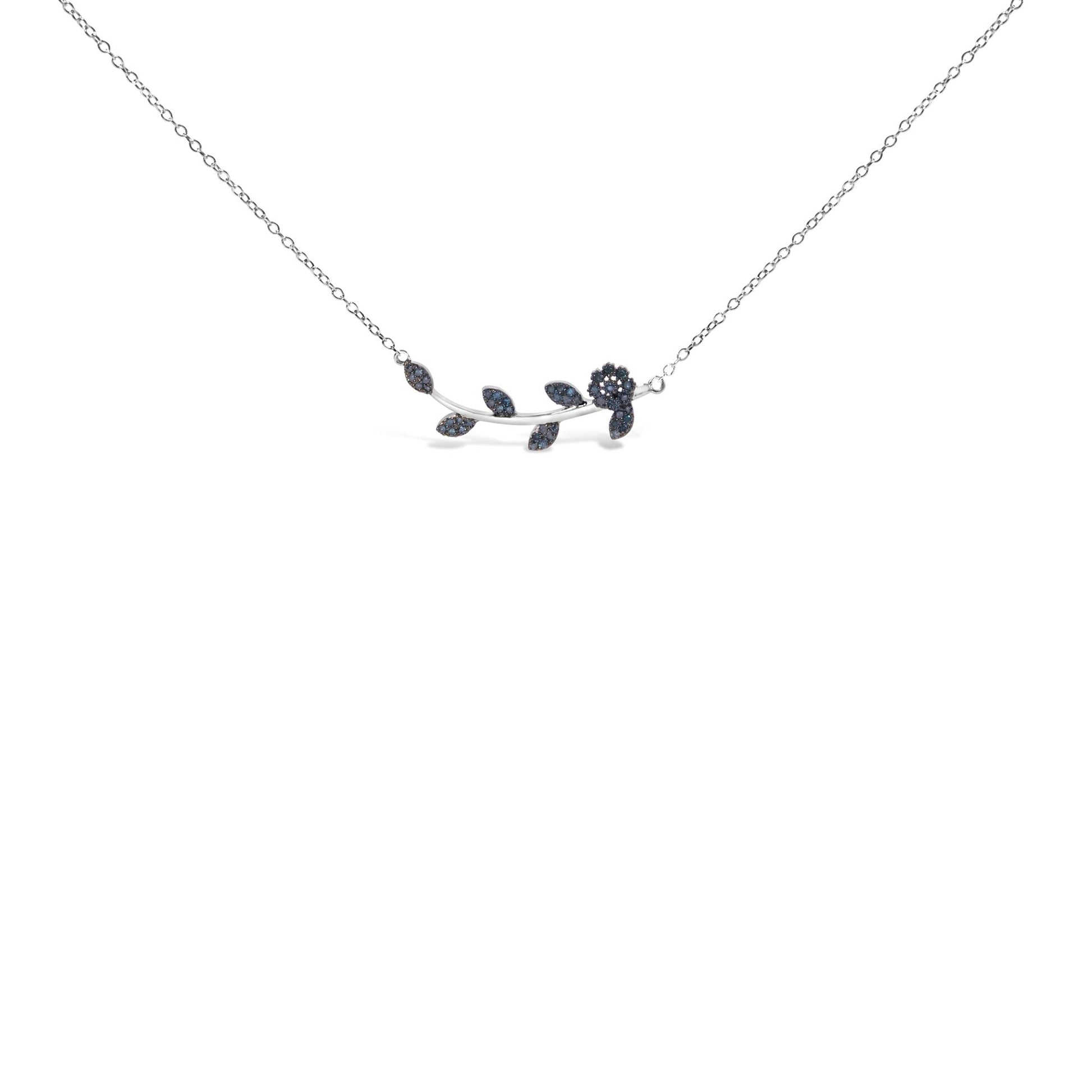 White metal necklace with a horizontal branch-shaped pendant featuring blue round gemstones in prong settings, shown in a front-facing angle.