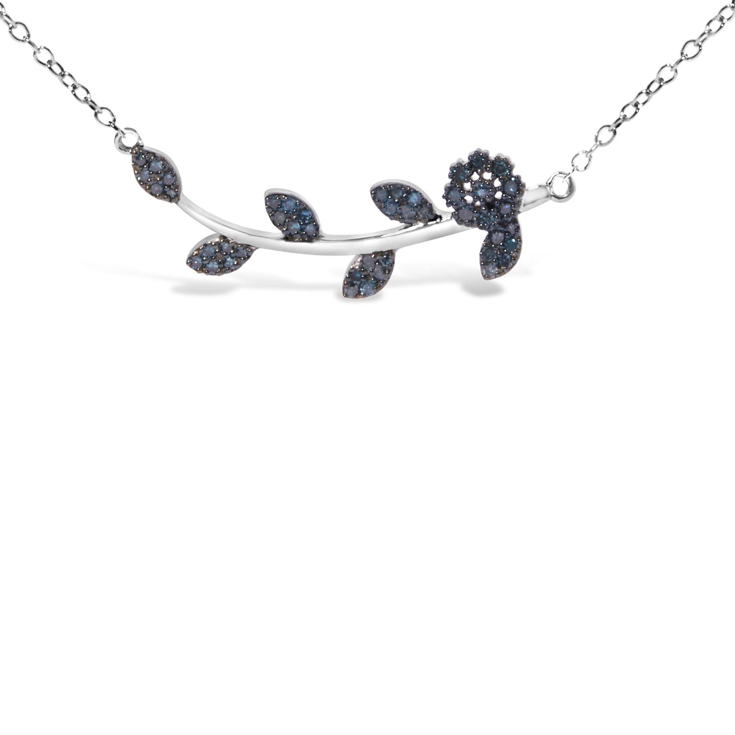 Close-up front view of a white necklace featuring a curved branch design with leaf shapes and a flower shape, all adorned with small blue round gemstones in prong settings.