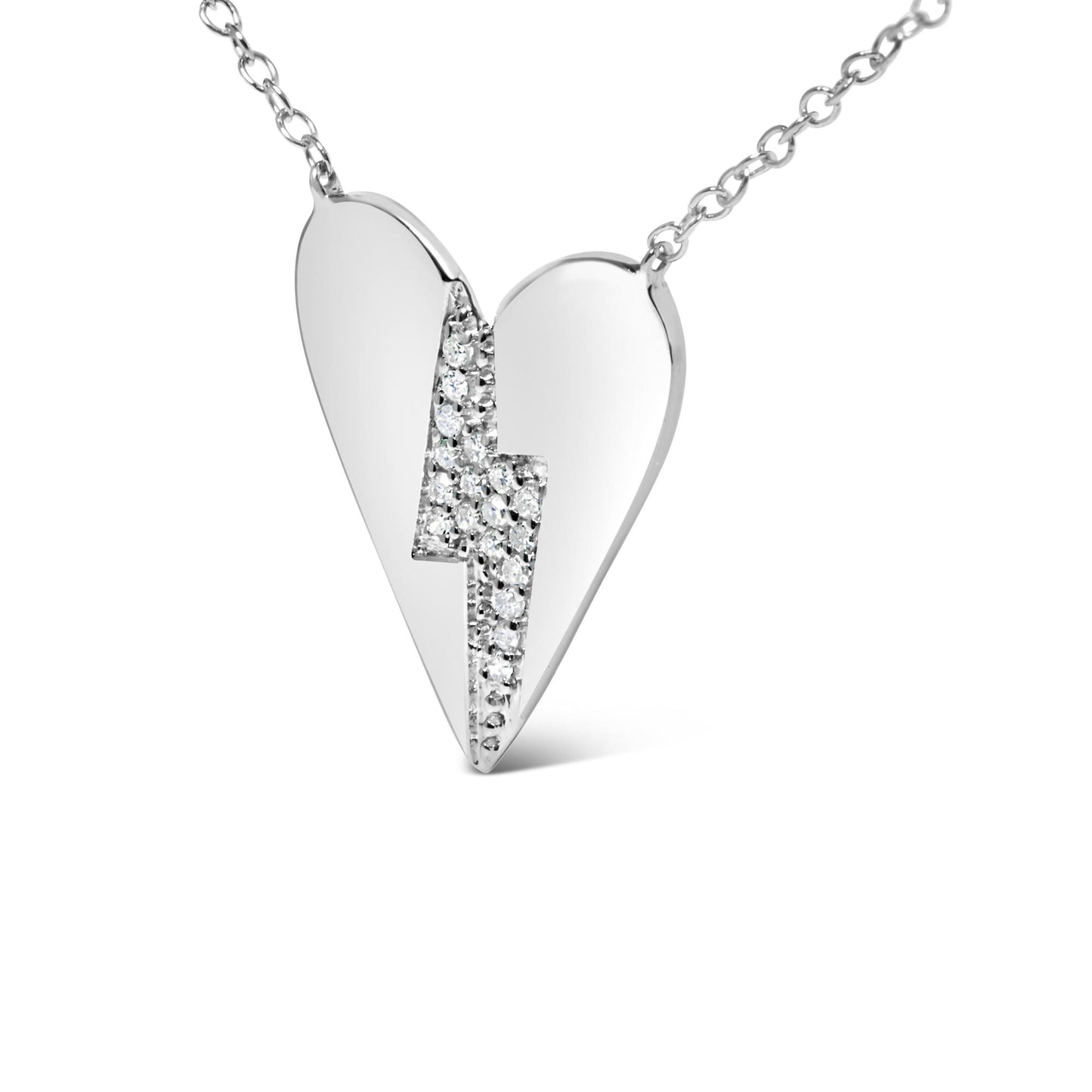 Front angled view of white metal heart-shaped necklace pendant with a zigzag design set with round prong-set white gemstones down the center.