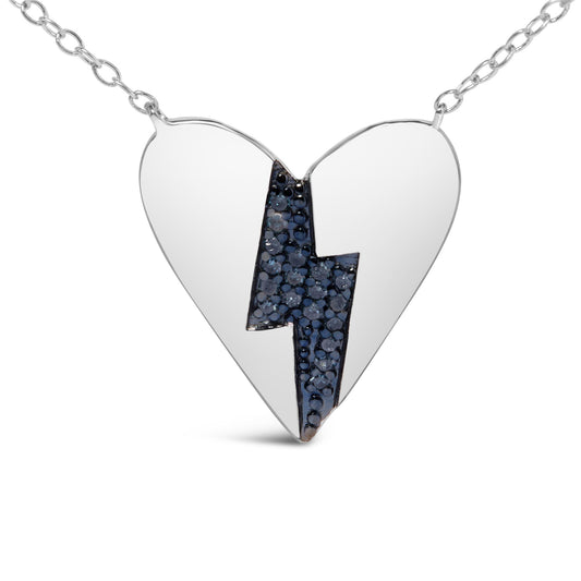 Close-up front view of a white metal heart-shaped necklace pendant with a lightning bolt design inlaid with round blue gemstones in prong settings.