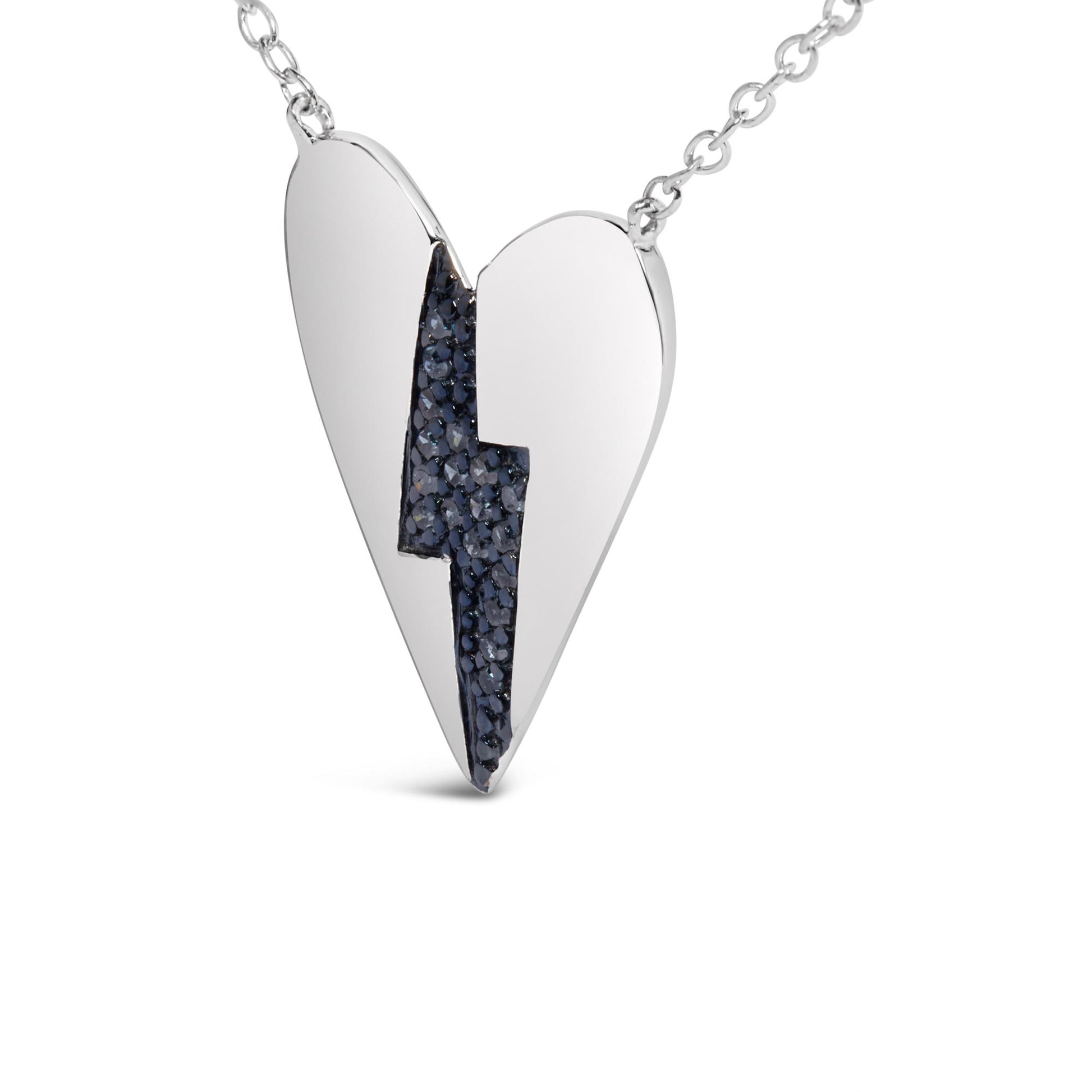 Front angled view of a white metal heart-shaped necklace pendant with a lightning bolt-shaped inset featuring multiple blue round prong-set gemstones.